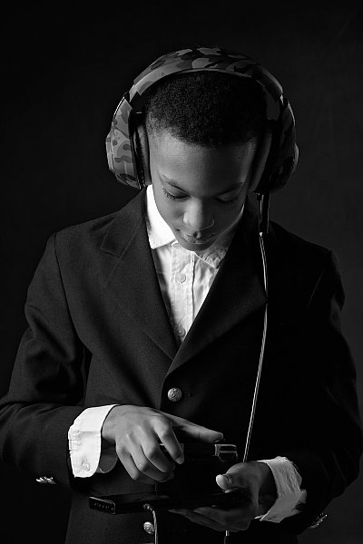 Young Man Listening to Headphones by I-Witness Photography LLC.jpg